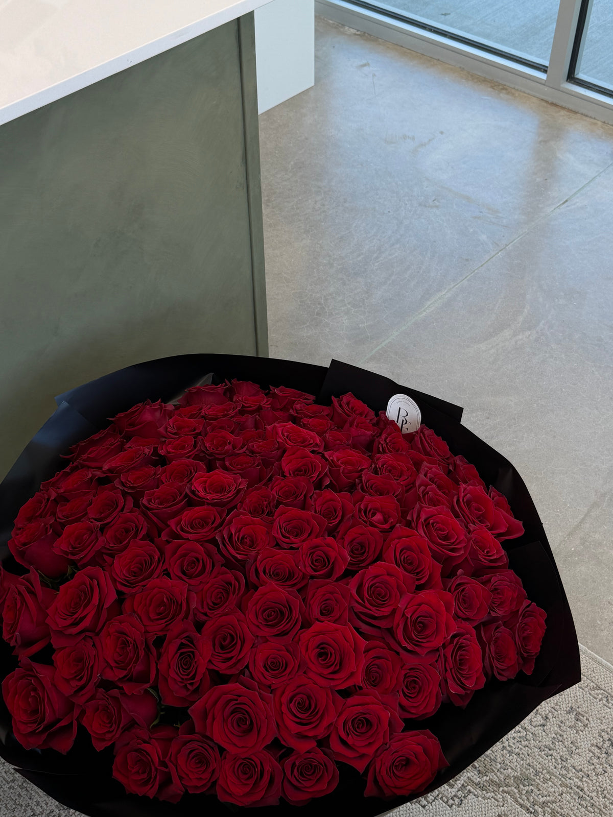 “101 red roses in a bouquet”