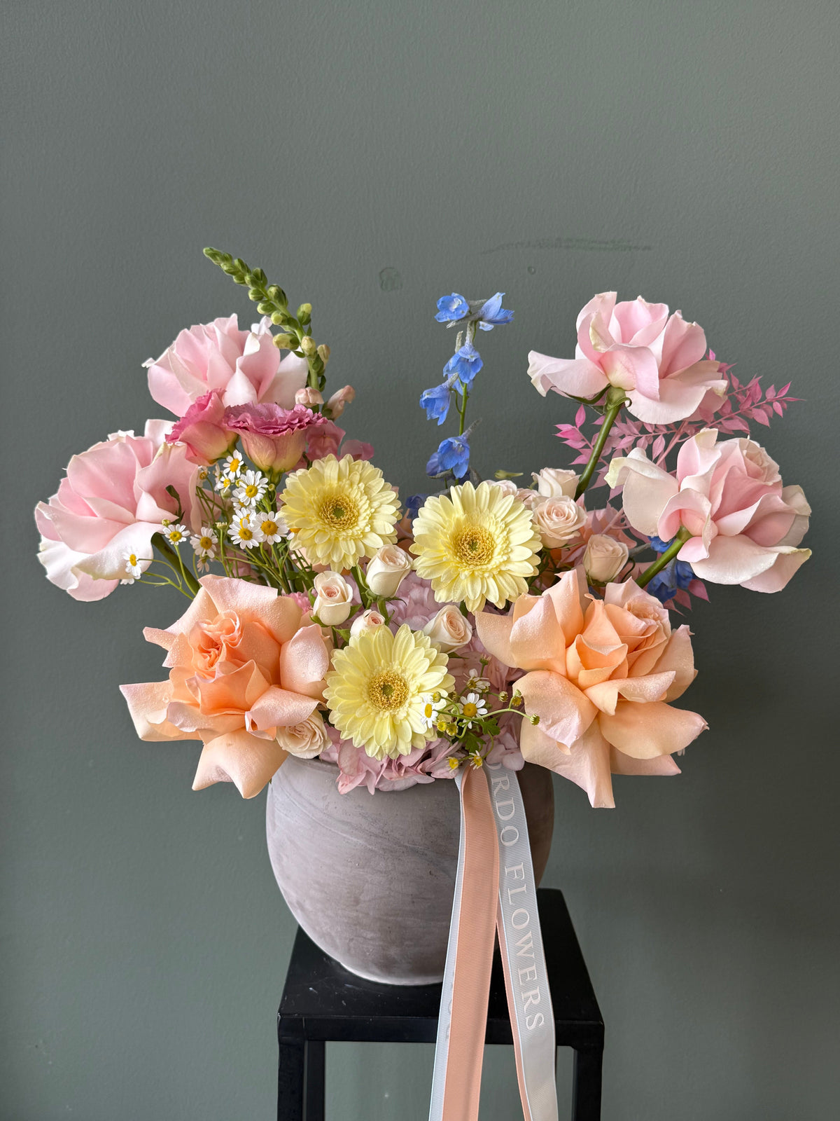 Vase “Lacy Bird” spring floral arrangement in soft blush tones