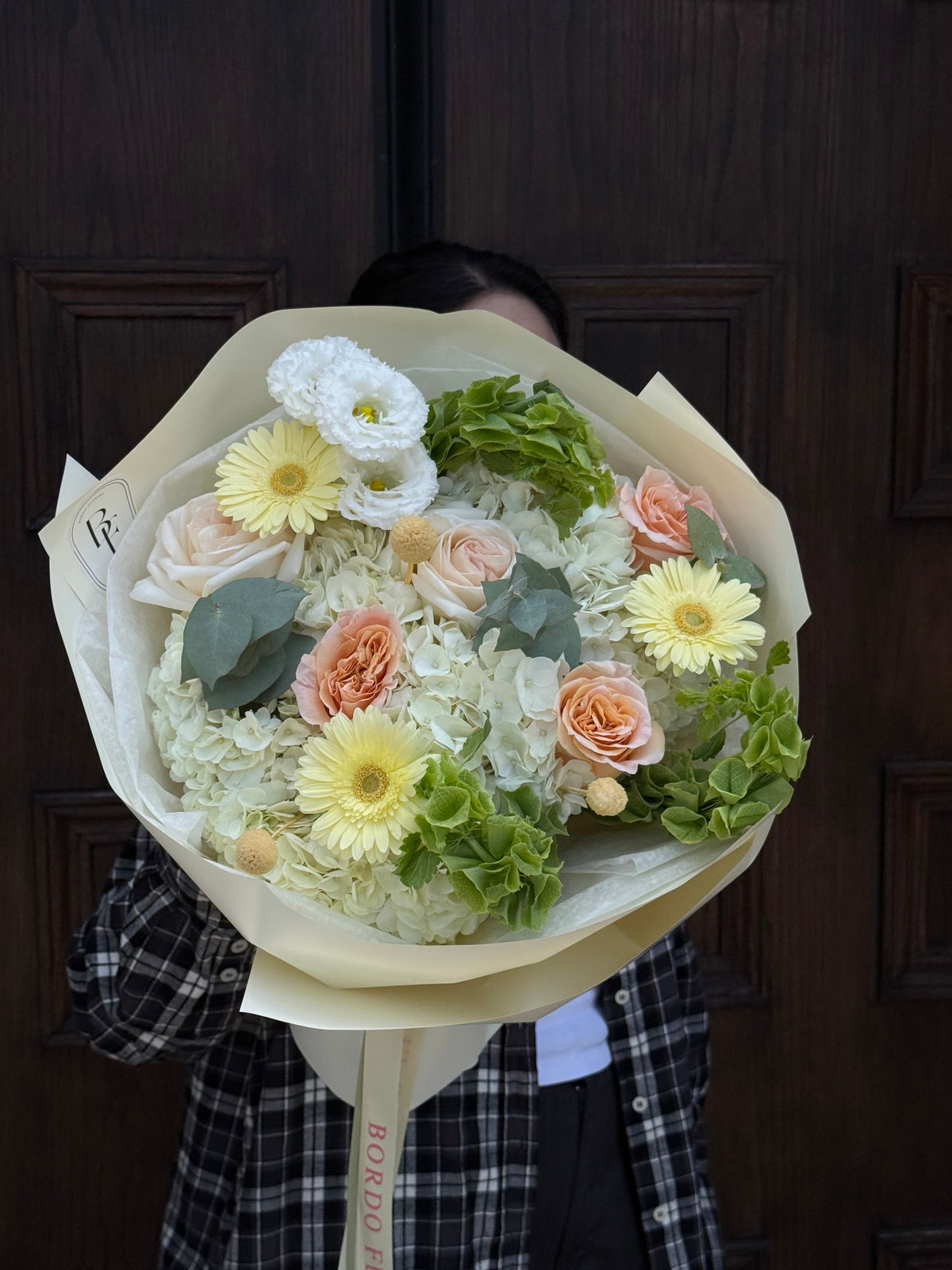 “Lemonade Sunset” peach, yellow, and white flower bouquet