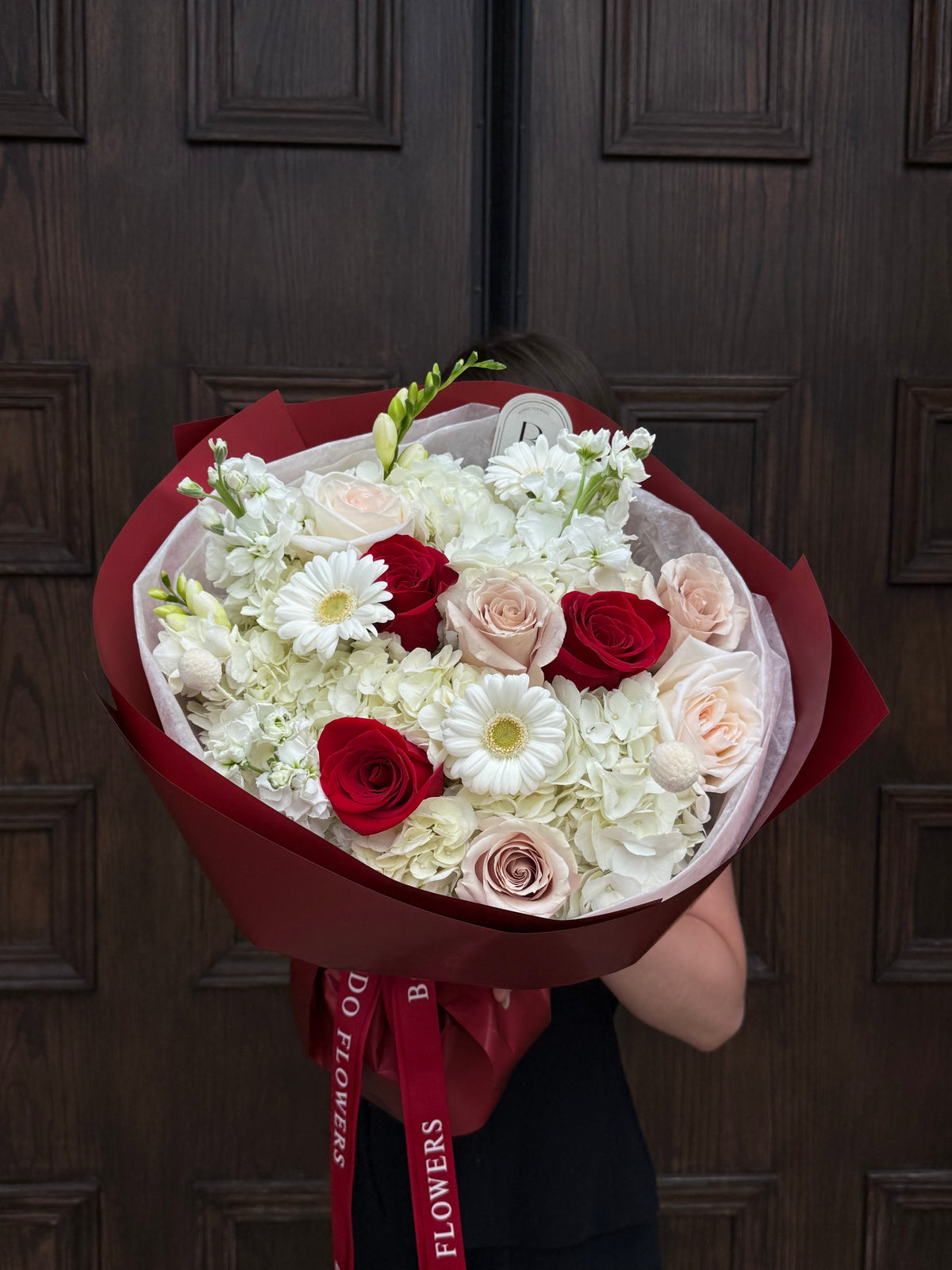 Elegant red and white floral bouquet by Bordo Flowers