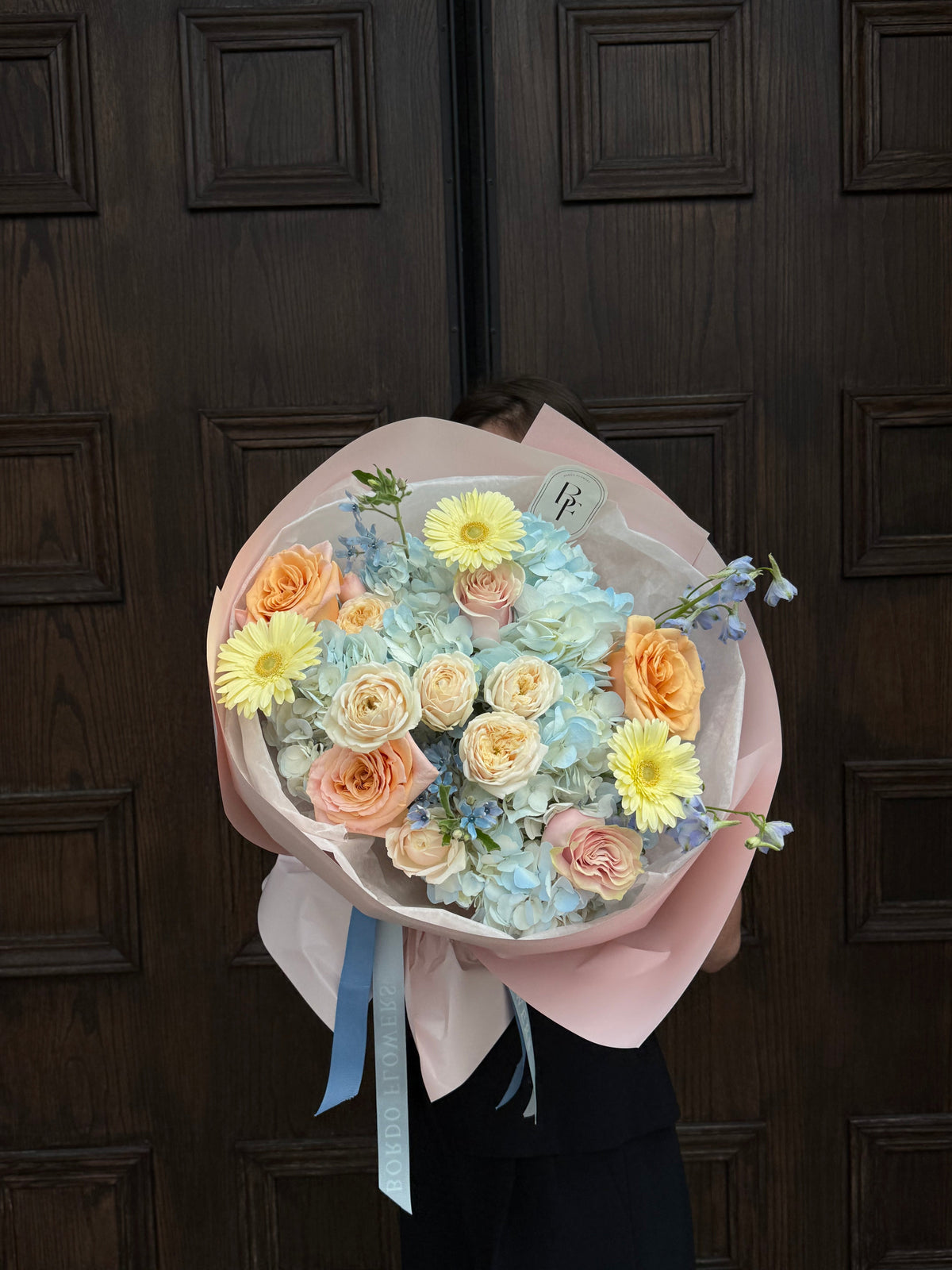 “Daphne” pink and peach flower bouquet with blue accents
