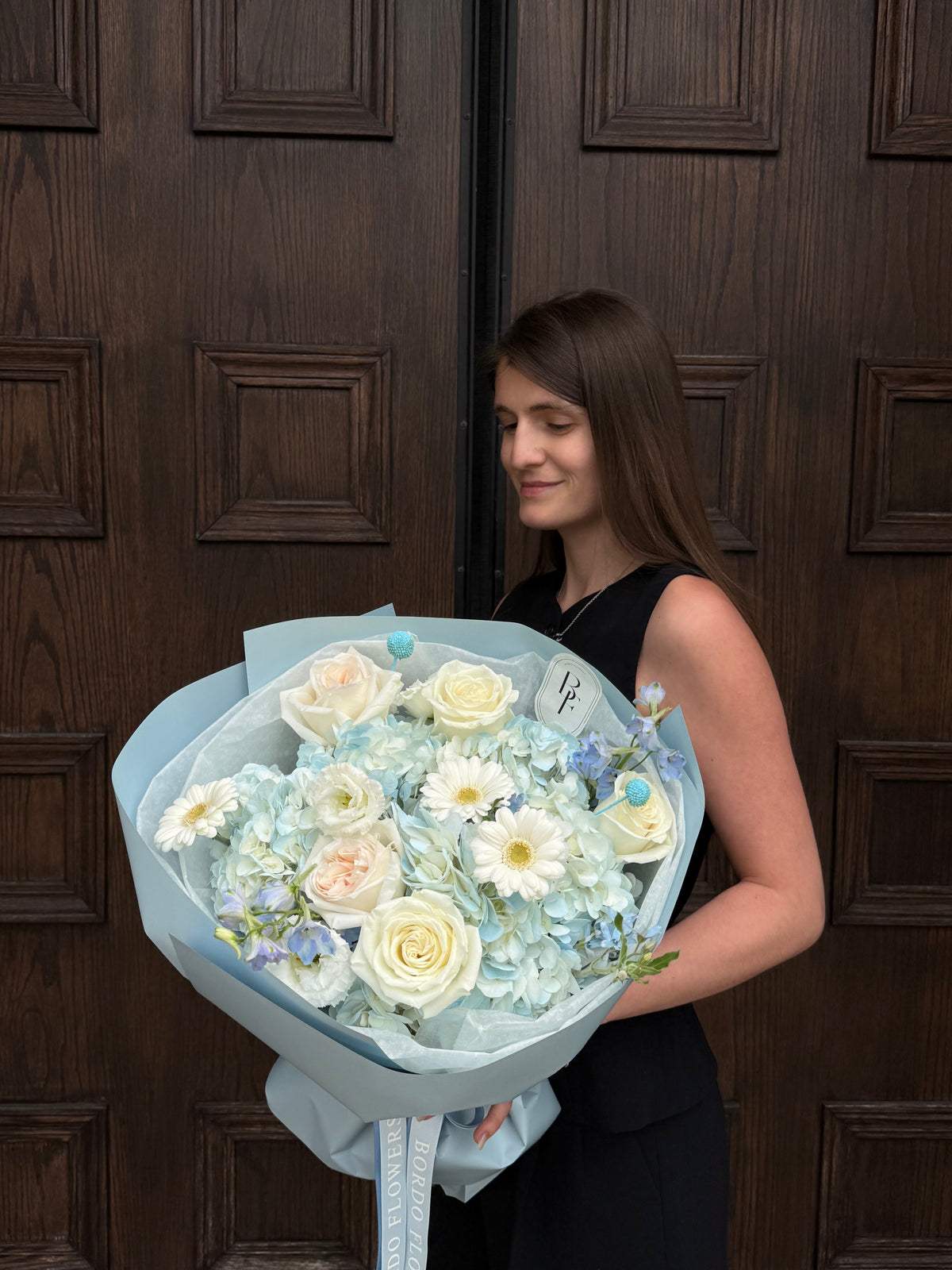 “BlueBerry” blue and white flower bouquet in sky blue wrapping