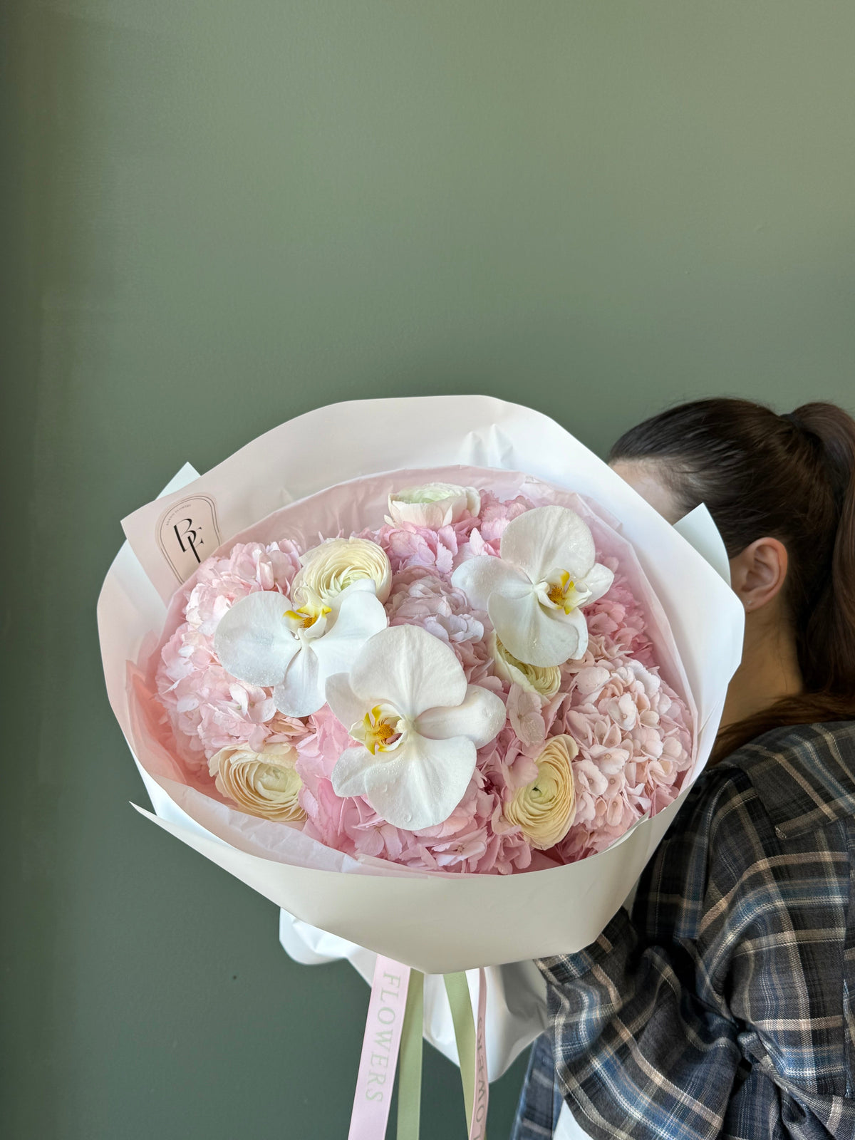 “Sweet Soufflé” pink hydrangea and ranunculus bouquet with orchids