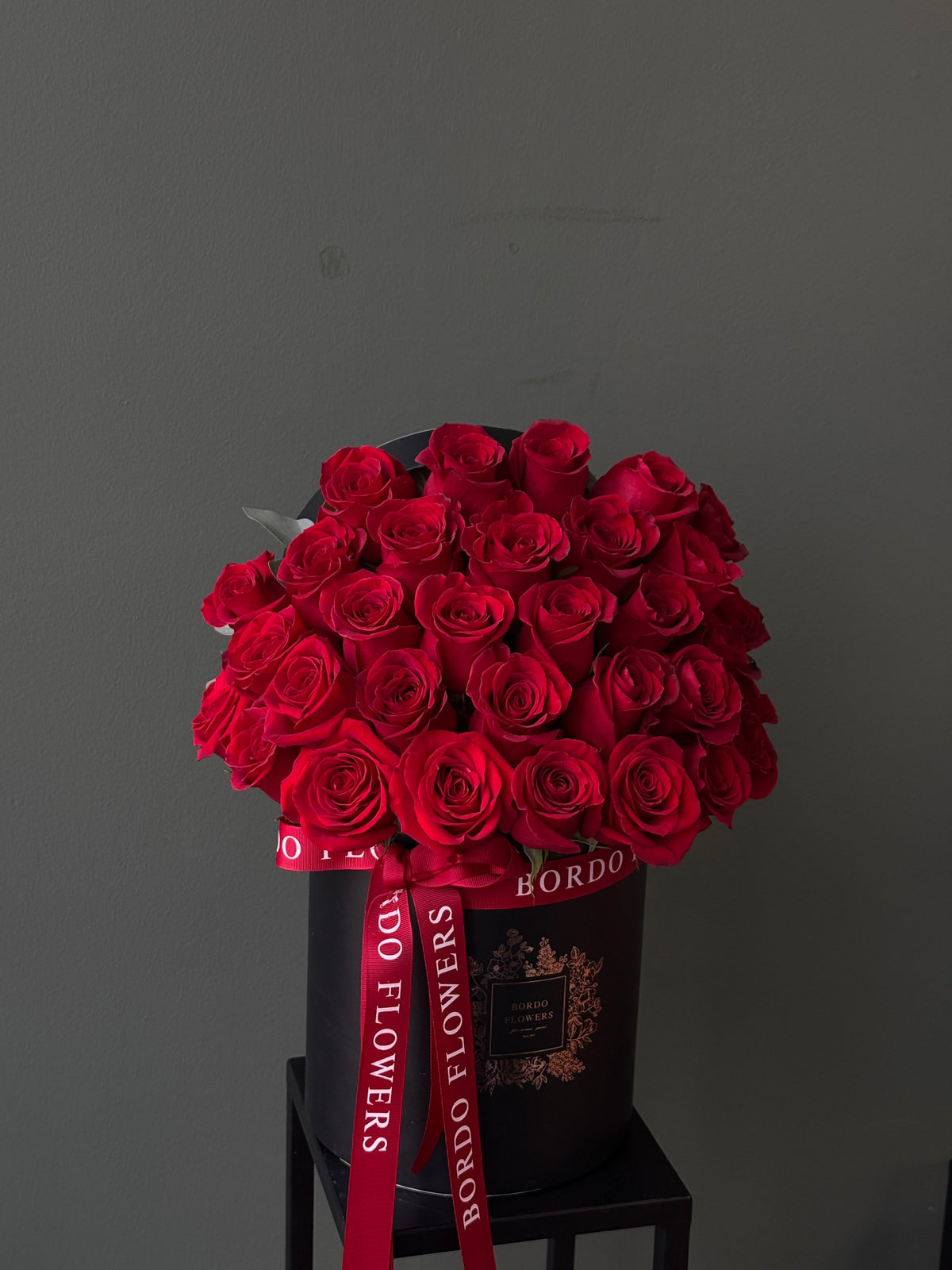 "Faith" arrangement: 33 premium roses in a refined box design with an elegant front-facing display. Includes wet floral sponge. Delivery in Dallas TX.